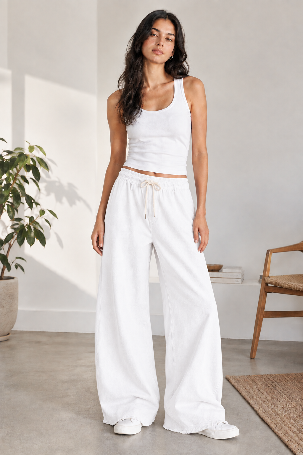 Woman wearing Eastrobe stretch wide-leg jeans in the XS–L fit