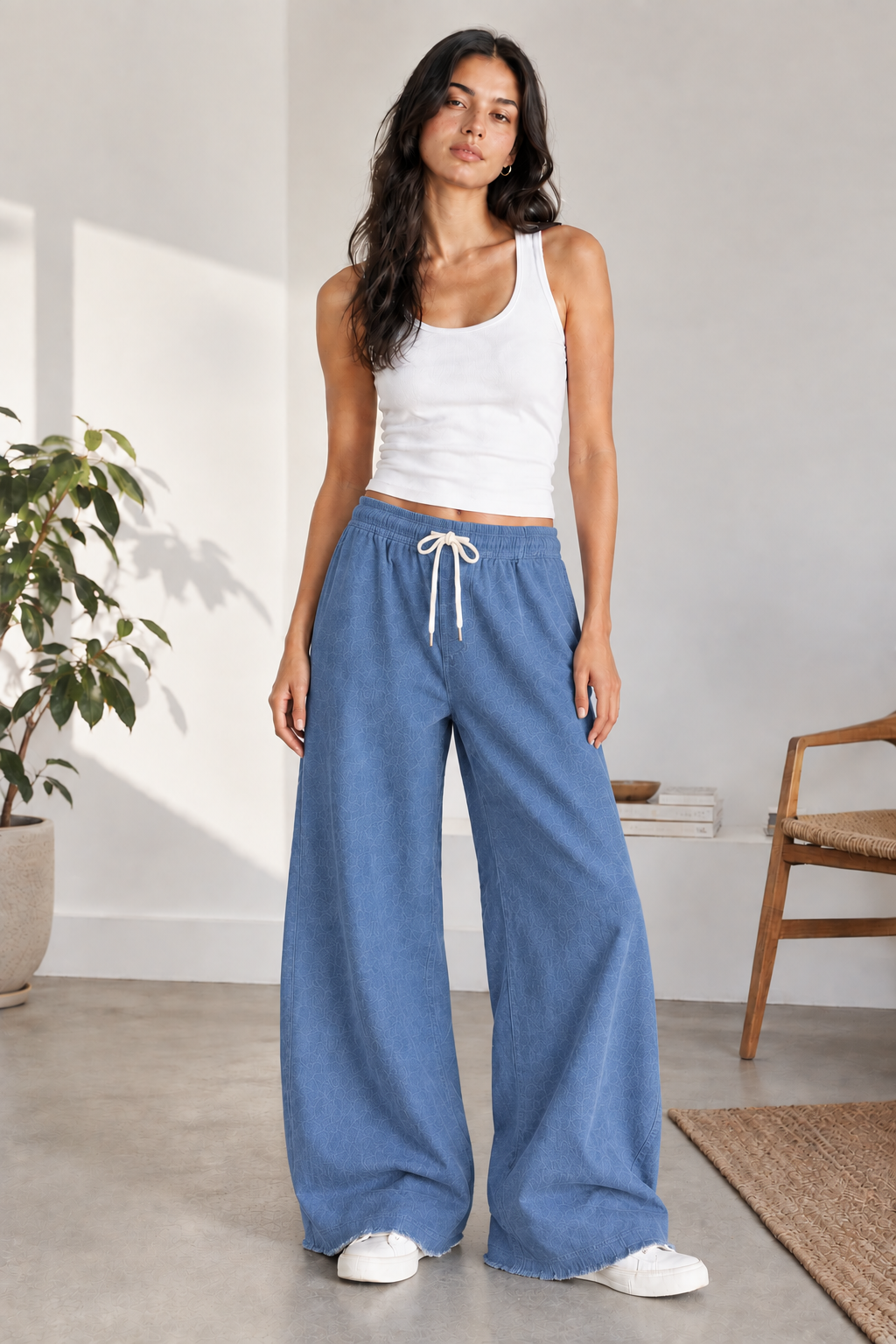 Eastrobe women's stretch wide-leg jeans shown on a model in the XS–L fit
