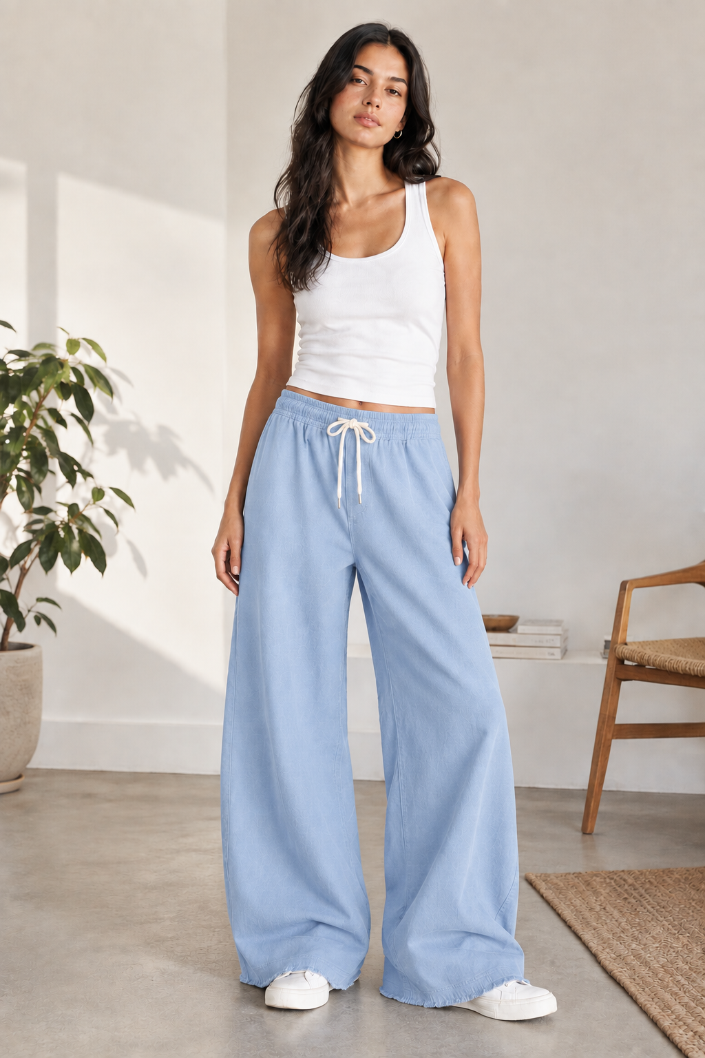 Model wearing Eastrobe women's comfortable stretch wide-leg jeans in XS–L